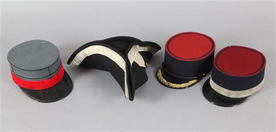 Various operas: A tri-corn hat and three military hats